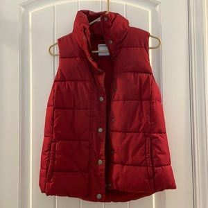 Old Navy size small red puffer vest zips and buttons